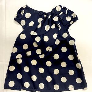 Girls H&M silky tank top with bow. Blue and white polka dots.